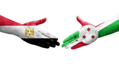 Burundi ve Mısır bayrakları arasındaki el sıkışma ellerinde resmedilmiş şeffaf görüntü.
