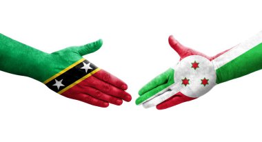 Burundi ve Saint Kitts ve Nevis bayrakları arasındaki tokalaşma..