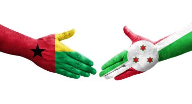 Burundi ve Gine Bissau bayrakları arasındaki el sıkışma..