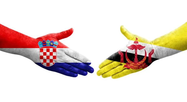 Handslag Mellan Brunei Och Kroatien Flaggor Målade Händer Isolerad Transparent — Stockfoto