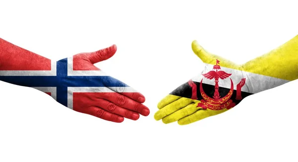Handslag Mellan Brunei Och Norge Flaggor Målade Händer Isolerad Transparent — Stockfoto