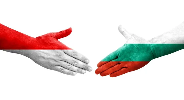 Рукостискання Між Болгарією Індонезією Прапори Намальовані Руках Ізольоване Прозоре Зображення — стокове фото