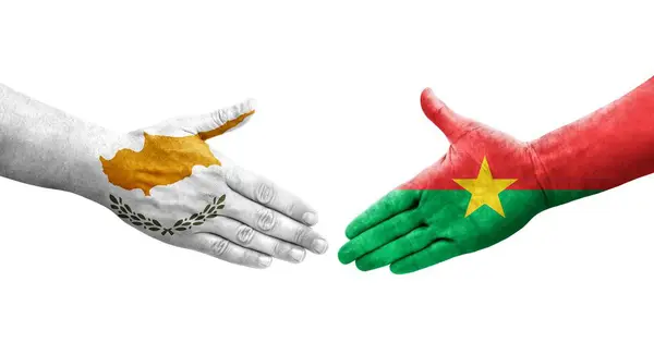 stock image Handshake between Burkina Faso and Cyprus flags painted on hands, isolated transparent image.