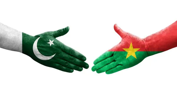 stock image Handshake between Burkina Faso and Pakistan flags painted on hands, isolated transparent image.