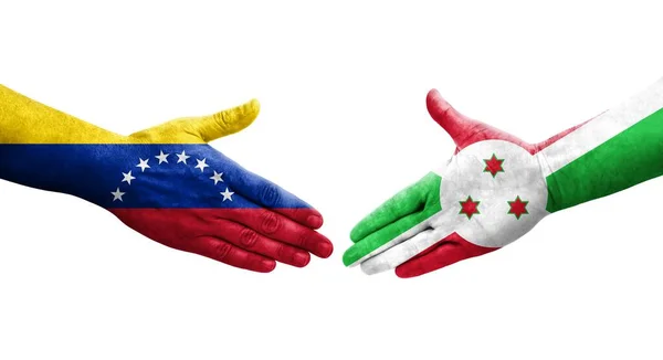 Χειραψία Μεταξύ Μπουρούντι Και Βενεζουέλας Σημαίες Ζωγραφισμένα Στα Χέρια Απομονωμένη — Φωτογραφία Αρχείου