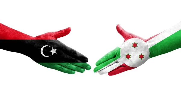 Stretta Mano Tra Burundi Libia Bandiere Dipinte Mani Immagine Isolata — Foto Stock