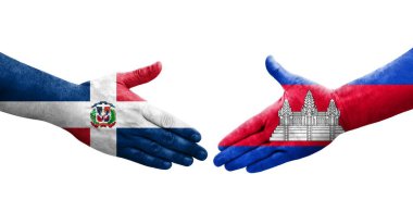 Kamboçya ve Dominik Cumhuriyeti bayrakları arasındaki el sıkışma, izole şeffaf görüntü.