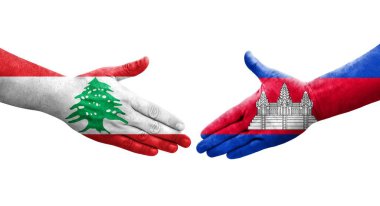 Kamboçya ve Lübnan bayrakları arasındaki el sıkışma ellerinde izole şeffaf görüntü.