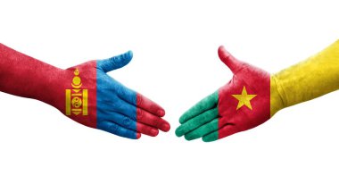 Kamerun ve Moğolistan bayrakları arasındaki el sıkışma, izole şeffaf görüntü.
