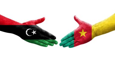Kamerun ve Libya bayrakları arasındaki el sıkışma, izole edilmiş şeffaf görüntü.