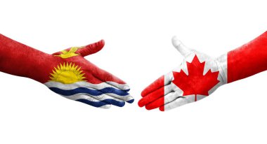 Ellerinde Kanada ve Kiribati bayrakları arasında el sıkışma, izole şeffaf görüntü.
