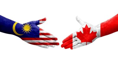 Ellerinde Kanada ve Malezya bayrakları arasında el sıkışma, izole şeffaf görüntü.