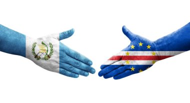 Cape Verde ve Guatemala bayrakları arasındaki el sıkışma, izole şeffaf görüntü.