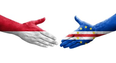 Cape Verde ile Monako bayrakları arasında el sıkışma, izole şeffaf görüntü.