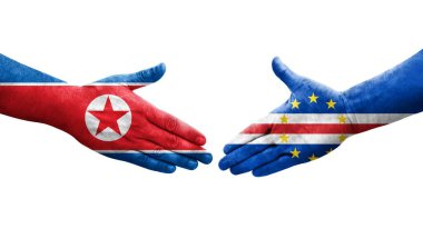 Cape Verde ile Kuzey Kore bayrakları arasındaki el sıkışma..