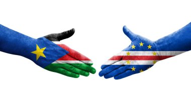 Cape Verde ile Güney Sudan bayrakları arasında el sıkışma, izole şeffaf görüntü.