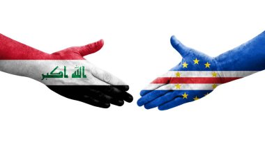 Cape Verde ve Irak bayrakları arasında el sıkışma, izole şeffaf görüntü.