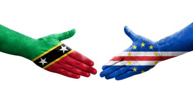 Cape Verde ile Saint Kitts ve Nevis bayrakları arasındaki el sıkışma..