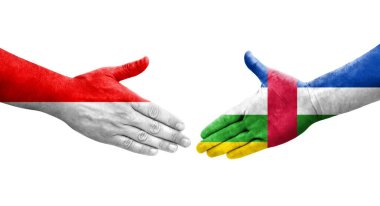 Orta Afrika Cumhuriyeti ile Endonezya bayrakları arasındaki el sıkışma, izole şeffaf görüntü.