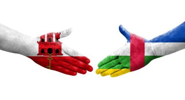 Orta Afrika Cumhuriyeti ile Cebelitarık bayrakları arasındaki el sıkışma..