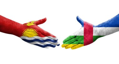 Orta Afrika Cumhuriyeti ve Kiribati bayrakları arasındaki el sıkışma, izole şeffaf görüntü.