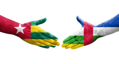 Orta Afrika Cumhuriyeti ile Togo bayrakları arasındaki el sıkışma, izole şeffaf görüntü.