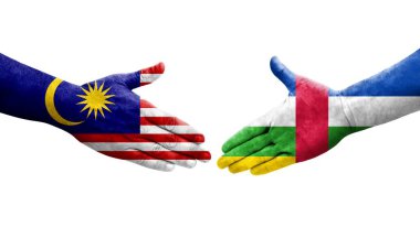 Orta Afrika Cumhuriyeti ile Malezya bayrakları arasındaki el sıkışma, izole şeffaf görüntü.
