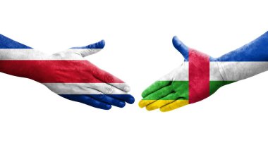 Orta Afrika Cumhuriyeti ile Kosta Rika bayrakları arasındaki el sıkışma, izole şeffaf görüntü.