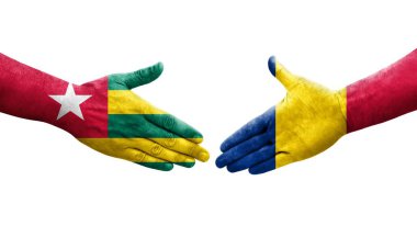 Ellerinde Chad ve Togo bayrakları olan el sıkışma, izole şeffaf görüntü.