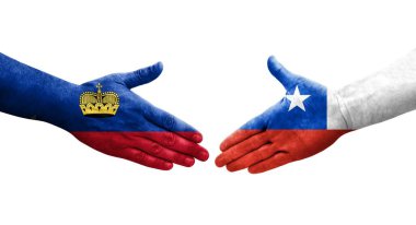 Şili ve Lihtenştayn bayrakları arasındaki el sıkışma, izole edilmiş şeffaf görüntü.