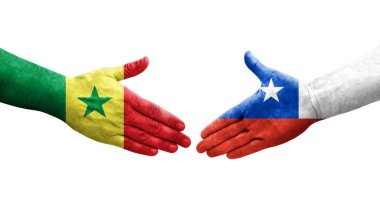 Ellerinde Şili ve Senegal bayrakları arasında el sıkışma, izole şeffaf görüntü.