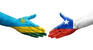 Şili ve Ruanda bayrakları arasındaki el sıkışma ellerinde resmedilmiş şeffaf görüntü.