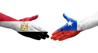 Şili ve Mısır bayrakları arasındaki el sıkışma ellerinde resmedilmiş şeffaf görüntü.