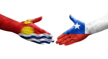 Ellerinde Şili ve Kiribati bayrakları arasında el sıkışma, izole şeffaf görüntü.
