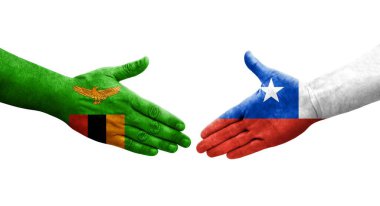 Ellerinde Şili ve Zambiya bayrakları arasında el sıkışma, izole şeffaf görüntü.