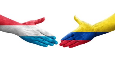 Kolombiya ve Lüksemburg bayrakları arasında el sıkışma, izole şeffaf görüntü.