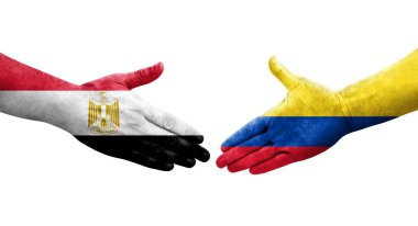 Kolombiya ve Mısır bayrakları arasındaki el sıkışma ellerinde resmedilmiş şeffaf görüntü.