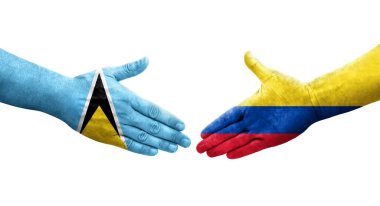 Kolombiya ve Saint Lucia bayrakları arasındaki el sıkışma..