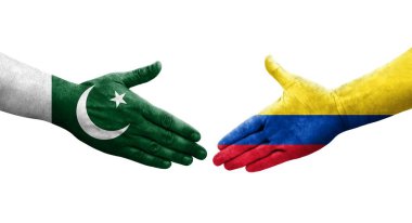 Kolombiya ve Pakistan bayrakları arasındaki el sıkışma, izole edilmiş şeffaf görüntü.