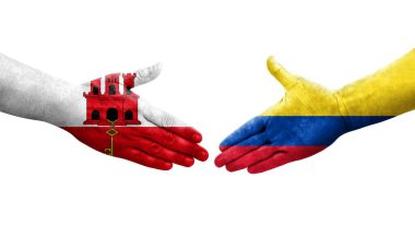 Kolombiya ve Cebelitarık bayrakları arasında el sıkışma, izole şeffaf görüntü.