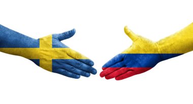 Ellerinde Kolombiya ve İsveç bayrakları arasında el sıkışma, izole şeffaf görüntü.