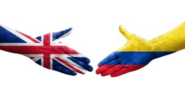 Kolombiya ve Birleşik Krallık bayrakları arasındaki el sıkışma ellerinde resmedilmiş şeffaf görüntü.