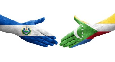 Comoros ve El Salvador bayrakları arasındaki tokalaşma ellerinde izole şeffaf görüntü.
