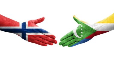 Ellerinde Comoros ve Norveç bayrakları arasında el sıkışma, izole şeffaf görüntü.