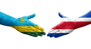 Kosta Rika ve Ruanda bayrakları arasındaki el sıkışma ellerinde resmedilmiş şeffaf bir görüntü.