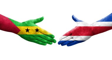 Kosta Rika ve Sao Tome ve Principe bayrakları arasındaki el sıkışma, izole şeffaf görüntü.