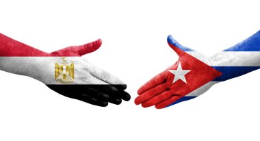 Küba ve Mısır bayrakları arasındaki el sıkışma ellerinde resmedilmiş şeffaf görüntü.