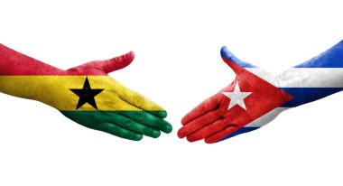 Küba ve Gana bayrakları arasındaki el sıkışma ellerinde resmedilmiş şeffaf görüntü.