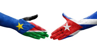Küba ve Güney Sudan bayrakları arasında el sıkışma, izole şeffaf görüntü.