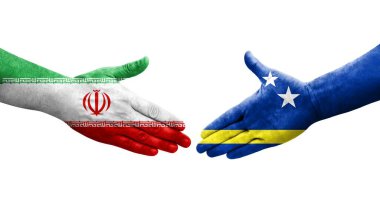 Curacao ve İran bayrakları arasındaki el sıkışma, izole edilmiş şeffaf görüntü.